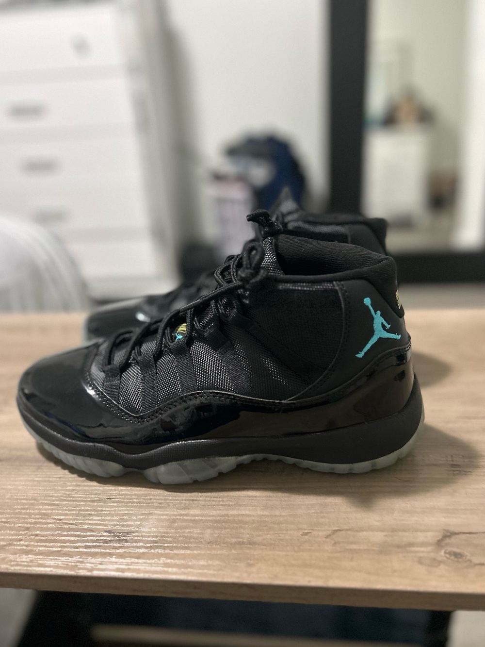 Jordan Men's Black High-Top Sneakers with Teal Jumpman Accent